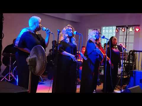 J'kar singing "Thin Line Between Love and Hate", backed by The Unit Band at Wine Down Wednesdays.