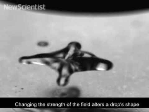 Levitating water drops form spinning stars
