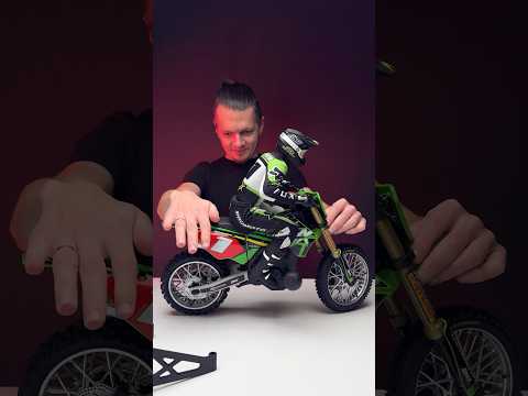 Losi Promoto 1/4 RC dirt bike with battery & charger. Realistic, stable, & powerful. Test drive soon