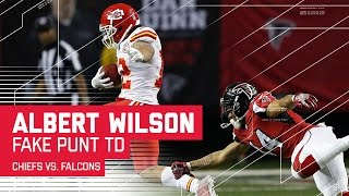 On this fake punt, Albert Wilson somehow emerges out of this pile untouched, and never stops running. 

