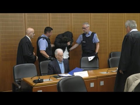 German court jails Syrian 'torture' doctor for life | AFP
