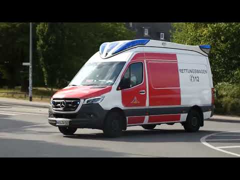 RTW 18/83-02+ NEF 03/82-01 auf Einsatzfahrt in die Uniklinik Rostock