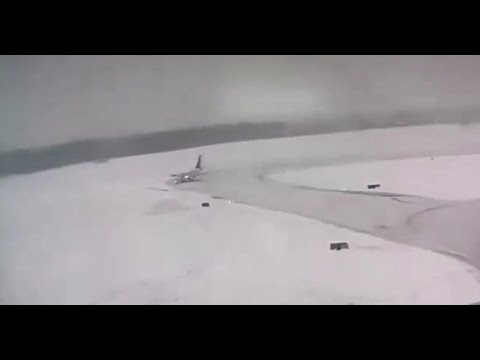 In the snow chaos: Plane skids off the runway