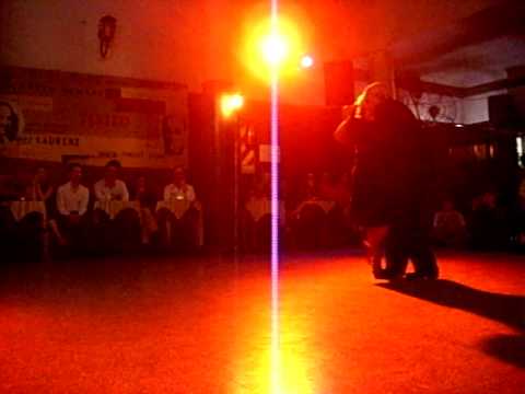  Carlos Perez  and  Rosa Forte  are  dancing  to  a  tango