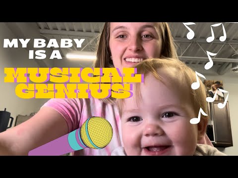 playing the piano and singing with my one year old daughter