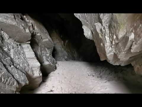 Exploring caves at Maghera beach, Donegal.