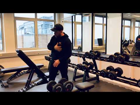 Skrå benkpress med manualer