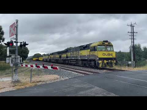 Chasing a QUBE Steel Train up the North East Line