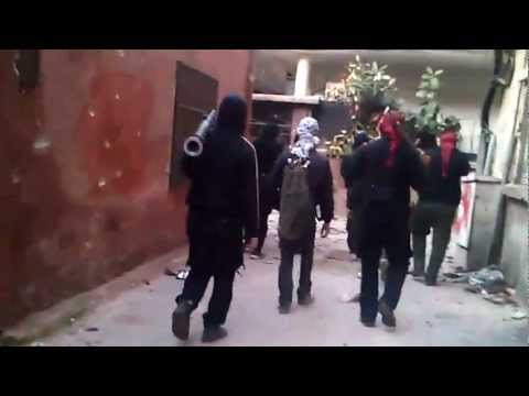 توجه عناصر كتيبة أحفاد سيدنا الحمزة لاقتحام حاجز السبورات في حي التضامن في مدينة دمشق