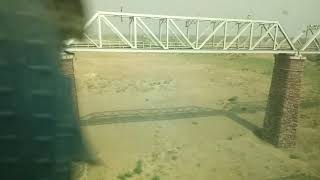 preview picture of video 'Bhopal Shatabdi crossing dried up river Chambal near Dholpur.'