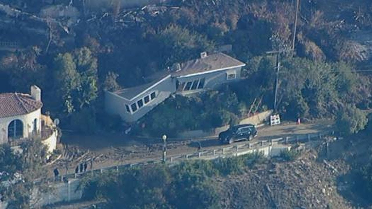 Home spared by Palisades Fire split apart by landslide as new risk emerges