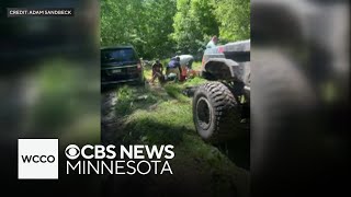 Men discover woman who had been missing for days stuck in mud