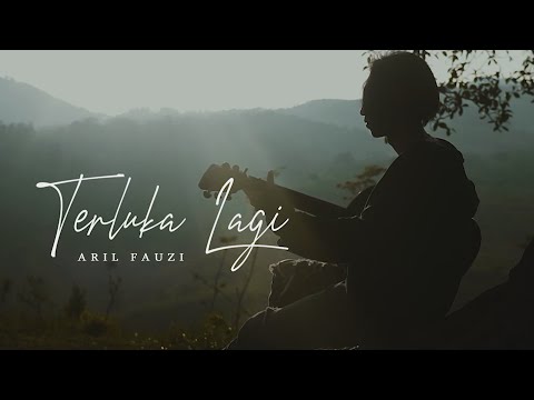 TERLUKA LAGI  - ARIL FAUZI ( OFFICIAL MUSIC VIDEO )