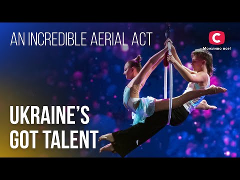 Holding his partner with teeth:😲 An incredible aerial act – Ukraine's Got Talent
