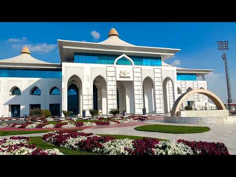 Exploring Qatar horse racing with HH The Amir Sword & Trophy | white feather