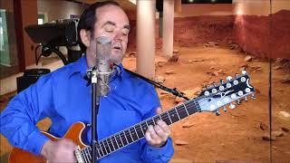 me singing Humans From Earth by T Bone Burnett