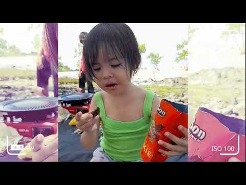 keseruan afifah main di pantai