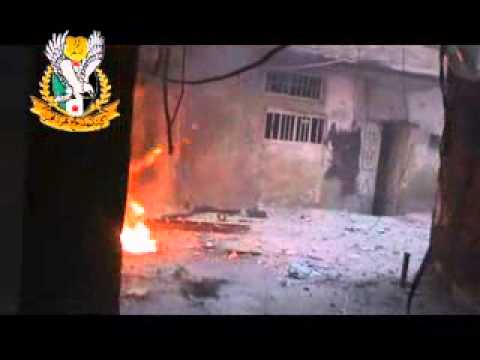 اشتباكات خلال اقتحام شارع نسرين في حي التضامن من قبل لواء الفاتحين في دمشق