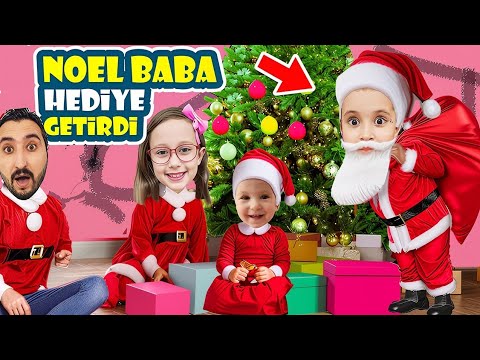 SANTA CLAUS CAME TO OUR HOUSE!! HE BROUGHT GIFTS FOR BAHAR, BANU, ALYA, AND ASEL MIRA!!