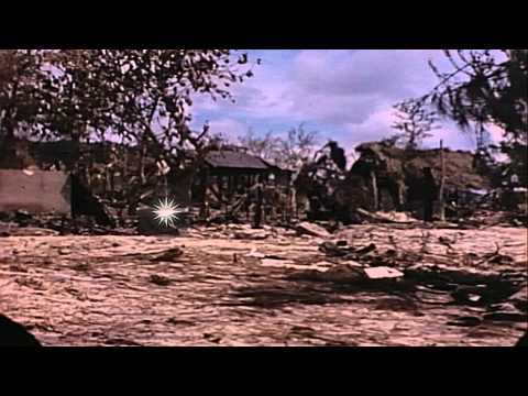 US Marines inspect rubbled buildings and wrecked Japanese tanks in Saipan, Marian...HD Stock Footage