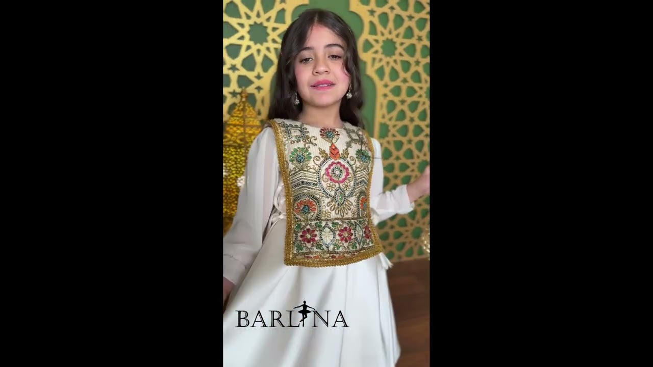 White girl's dress with a fully embroidered bodice - year 1