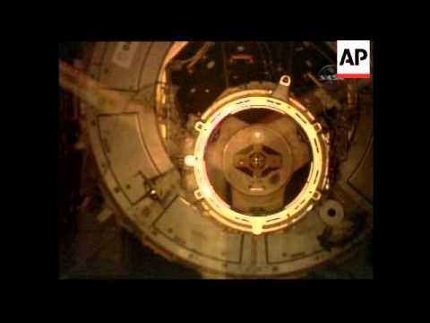 Shuttle docks at space station despite technical problems
