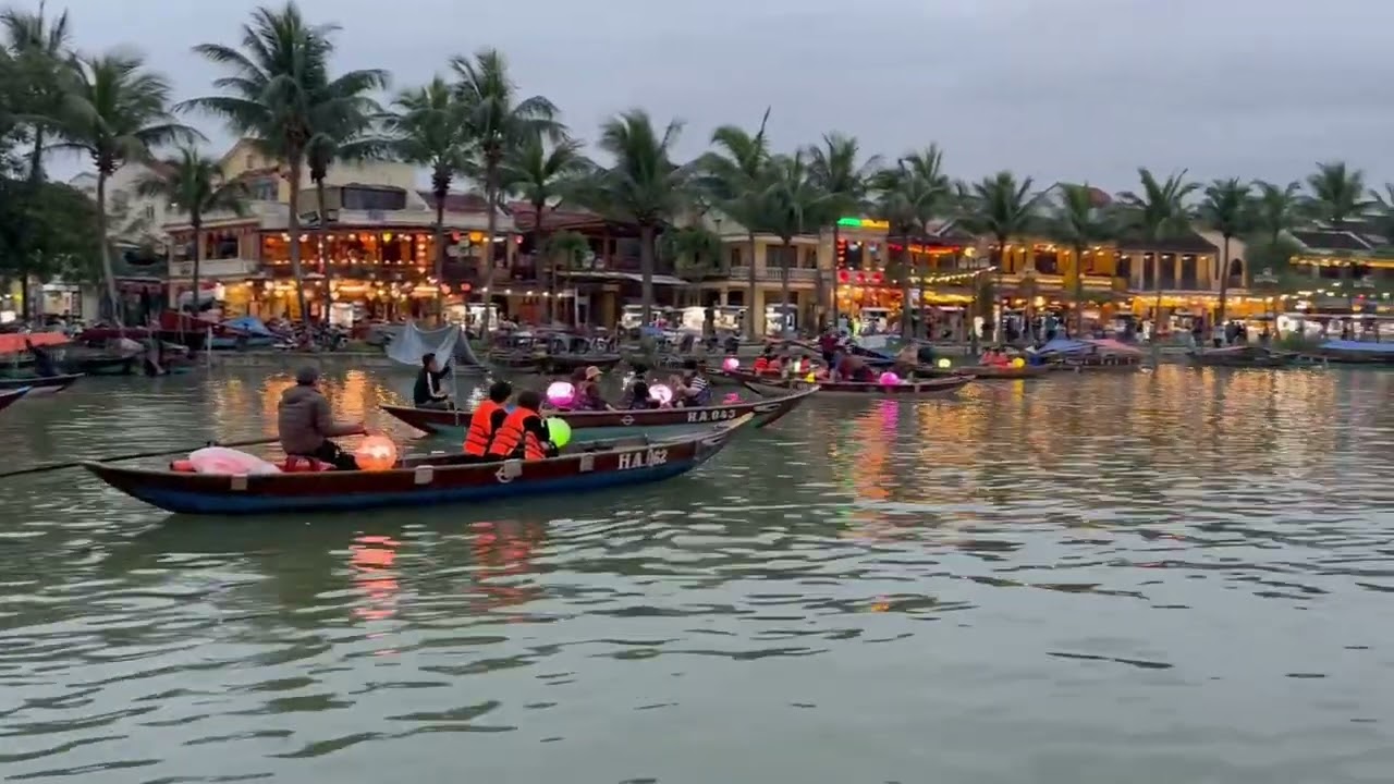 Experience boat ride on serene waters of Hoai River.