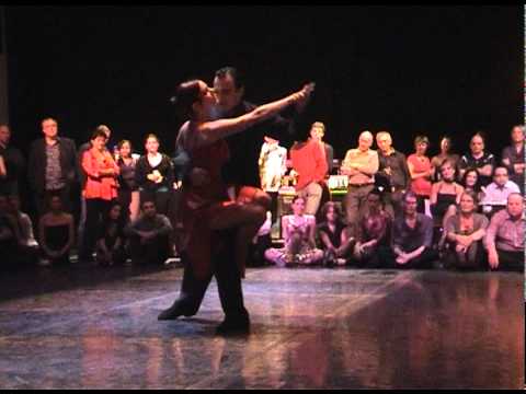  Esteban Moreno  and  Claudia Codega  are  dancing  to  a  tango