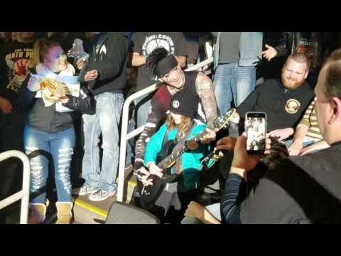 DJ of Sixx AM in audience with young fan