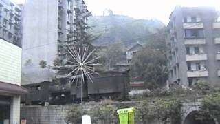 preview picture of video 'Chinese steam - Shibanxi - passenger & coal train through Yuejin, 2006'