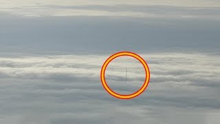 During Flight Man Spots Strange Object Through Clouds Takes Photo And Is Amazed At What It Was.