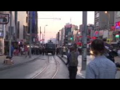 Protesters clash with riot police