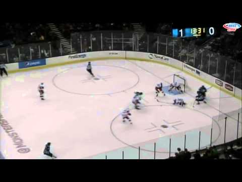 Double Tough: Xavier Ouellet makes the defensive play then takes a high stick to the face