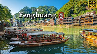 With China Walking Tour . . . FengHuang Ancient Water Town Visitor Guide Fenghuang Ancient Town, located in western Hunan Province, is one of China`s most well-preserved ancient towns, known for its picturesque riverside setting, traditional wooden houses, and rich cultural heritage. This guide will help you explore the town’s unique charm and provide practical information to ensure a memorable visit. Overview of Fenghuang Ancient Town History & Culture: Fenghuang, meaning `Phoenix,` was built in the Ming Dynasty (around 1704) and is a stunning example of traditional Chinese architecture and riverside living. The town is home to the Miao and Tujia ethnic minorities, whose distinct customs, folk art, and architecture add a rich cultural layer to the town`s charm. Strolling along the banks of the Tuojiang River, you’ll be surrounded by ancient stilted houses (diaojiaolou), stone-paved streets, and peaceful bridges that seem frozen in time. Why Visit: With its well-preserved historical architecture, vibrant local culture, and scenic river views, Fenghuang is a must-visit destination for those interested in Chinese history, culture, and photography. Visitors can enjoy riverboat rides, explore narrow alleyways, and visit local shops selling traditional crafts. Key Attractions in Fenghuang Tuojiang River The lifeblood of Fenghuang, the Tuojiang River runs through the heart of the town. Stroll along its banks, take a boat ride, or photograph the iconic wooden houses perched on stilts over the water. The river comes alive at night, with beautifully illuminated buildings reflecting on the water. Diaojiaolou (Stilt Houses) The stilted wooden houses that line the Tuojiang River are some of Fenghuang`s most recognizable architectural features. These traditional houses, built by the Miao people, offer a glimpse into the area`s ancient construction techniques and local way of life. Many of these houses are now home to cafes, guesthouses, and shops. Hongqiao Wind and Rain Bridge One of the most famous landmarks in Fenghuang, the Hongqiao Bridge is a beautiful covered bridge with traditional Chinese architecture. It serves as both a pedestrian passage and a scenic spot for photographs. Inside, the bridge hosts shops selling local crafts and snacks. East Gate Tower The East Gate Tower (Dongmen Tower) was originally built as part of the town`s fortifications during the Ming Dynasty. This well-preserved tower offers great views of the ancient town and the river. A walk through the gates is a step back into the town’s historical past. Miao Ethnic Museum This museum provides an in-depth look at the culture, history, and lifestyle of the Miao ethnic group, which is native to the Fenghuang area. It is an excellent stop for those interested in learning more about the rich cultural traditions of the region, including their festivals, clothing, and traditional crafts. Travel Tip: While the daytime charm of Fenghuang is undeniable, the town is especially magical at night, when the lights illuminate the riverside buildings and bridges, creating a serene atmosphere for evening strolls. Practical Travel Information for Fenghuang When to Visit The best time to visit Fenghuang Ancient Town is during the spring (April-May) and autumn (September-October) seasons, when the weather is pleasant, and the crowds are more manageable. Summer can be hot and humid, while winter, though quieter, can be quite cold, especially in the mornings and evenings. Getting to Fenghuang By Air: The nearest airport is Tongren Fenghuang Airport, which is about 30 kilometers from the town. From the airport, travelers can take a bus or taxi to reach Fenghuang. Alternatively, visitors can fly into Zhangjiajie or Changsha and take a bus or train to the town, though this will involve a longer journey. By Train: Fenghuang does not have a train station, but the nearest train station is Jishou Railway Station, about 50 kilometers away. From there, travelers can take a bus or taxi to Fenghuang, which takes about an hour. By Bus: Regular buses run from nearby cities such as Zhangjiajie, Jishou, and Changsha. The bus journey from Zhangjiajie to Fenghuang takes approximately 4 hours, while it is around 6 hours from Changsha. Accommodation Fenghuang offers a wide range of accommodation options, from budget guesthouses to boutique hotels. Many of the traditional stilt houses along the river have been converted into guesthouses, offering a unique stay with scenic river views. For those seeking more comfort, hotels in the town center provide modern amenities. It’s recommended to book in advance during peak travel seasons. Cultural Sensitivity As Fenghuang is home to ethnic minorities such as the Miao and Tujia, visitors should be mindful of local customs. When visiting minority villages or interacting with locals, it`s important to respect their traditions and dress modestly. Always ask for permission before taking photographs of local people, especially in more rural areas. Language Mandarin is the official language, but many locals also speak the Miao language. English is not widely spoken, so it`s useful to have a translation app or learn a few basic Mandarin phrases to make communication easier. Local Cuisine Fenghuang’s cuisine reflects the flavors of Hunan Province, known for its spicy dishes. Be sure to try the local specialties, such as sour fish soup (suantang yu), Miao-style grilled fish, and pickled vegetables. There are also numerous street food vendors offering local snacks like glutinous rice cakes and fried tofu. Travel Tip: Fenghuang can be quite crowded during Chinese public holidays, especially the National Day Golden Week in October. Plan your visit outside these peak periods for a more peaceful experience. Suggested Itinerary for Exploring Fenghuang Day 1: Arrive in Fenghuang, check in to your riverside guesthouse, and take an evening stroll along the Tuojiang River to enjoy the illuminated scenery. Day 2: Visit the Hongqiao Wind and Rain Bridge, explore the East Gate Tower, and take a riverboat ride along the Tuojiang River. In the afternoon, wander through the ancient alleyways and visit the Miao Ethnic Museum. Day 3: Explore the surrounding countryside by visiting nearby Miao or Tujia villages, where you can learn more about their traditional crafts and culture. Return to Fenghuang in the evening for dinner and a relaxed evening by the river. FengHuang ancient water town, HuNan province - visitor guide