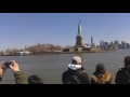 FROM LIBERTY TO ELLIS WITH AWE