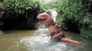 T-Rex at a waterfall