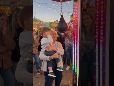 Grandma smashes the strength tester, her grandson’s punch barely registers 😂