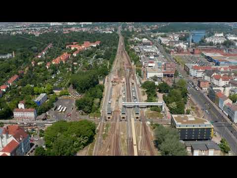 Aerial view of S bahn train driving to Schoneweide train station. Maintenance and modernization of