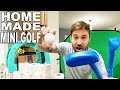 WE MADE A HOMEMADE MINI GOLF COURSE IN OUR HOUSE