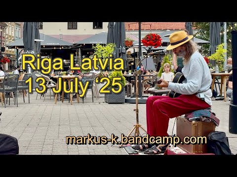Howl at the Moon - Markus K busking in Latvia