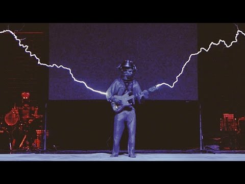 Iron Man with Musical Tesla Coils, a Robot and MIDI Guitar