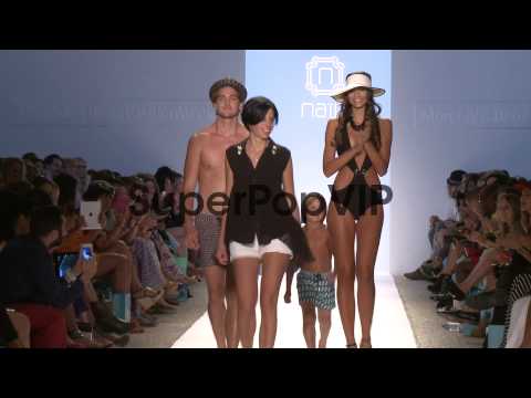 Designer Naila Chbib  and models walk the runway during t...