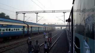 preview picture of video '11013 LTT-CBE Kurla Express meets 16628 MAQ-MAS West coast at Tirupur'