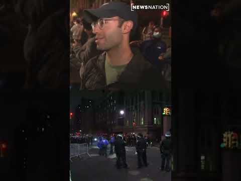 Masked protester interrupts live broadcast at Columbia