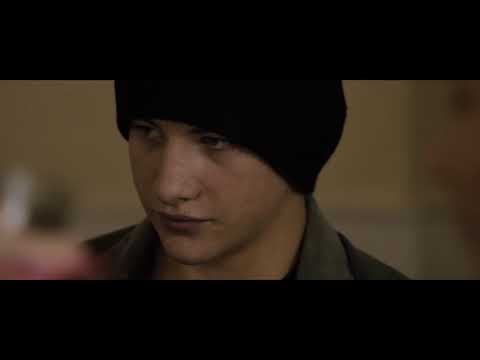 Dark Places trailer still showing tense confrontation in a hallway