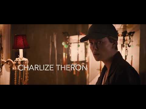 Dark Places trailer frame with Nicholas Hoult and Charlize Theron in a dim bar