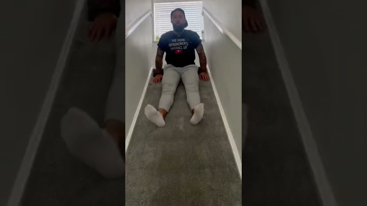 HOW TO MAKE AN INDOOR SLIDE ON YOUR STAIRS 🛝 #stairs #slide #carpet #diy  #homeimprovement #shorts