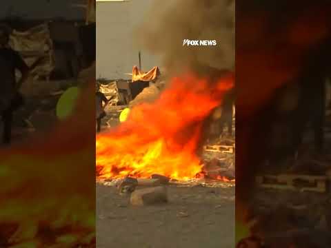 Spanish residents destroy migrant camp after mass crossing