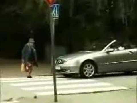 Granny crossing street takes on impatient driver
