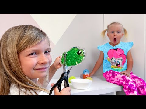 WHAT'S INSIDE? SOFIA AND NIKA ARE CUTTING OUT ANTISTRESS DRUGSTORE. SOFIA IS A SMALL GIRL.